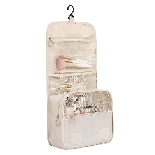 Beige hanging travel organizer with makeup items on a white background