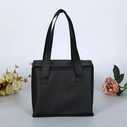 Black tote bag on a white background with flowers