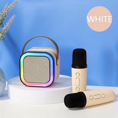 Colorful portable speaker and two microphones on a white platform with a blue background