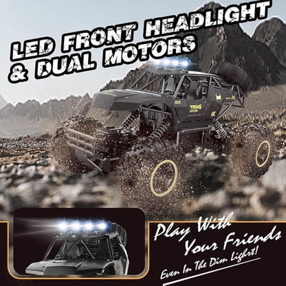 Toy truck with LED front headlights and dual motors in a desert setting