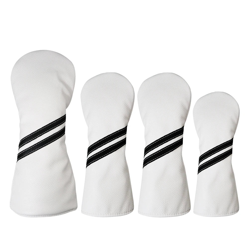 Four white golf club heads with black and white striped patterns on a white background