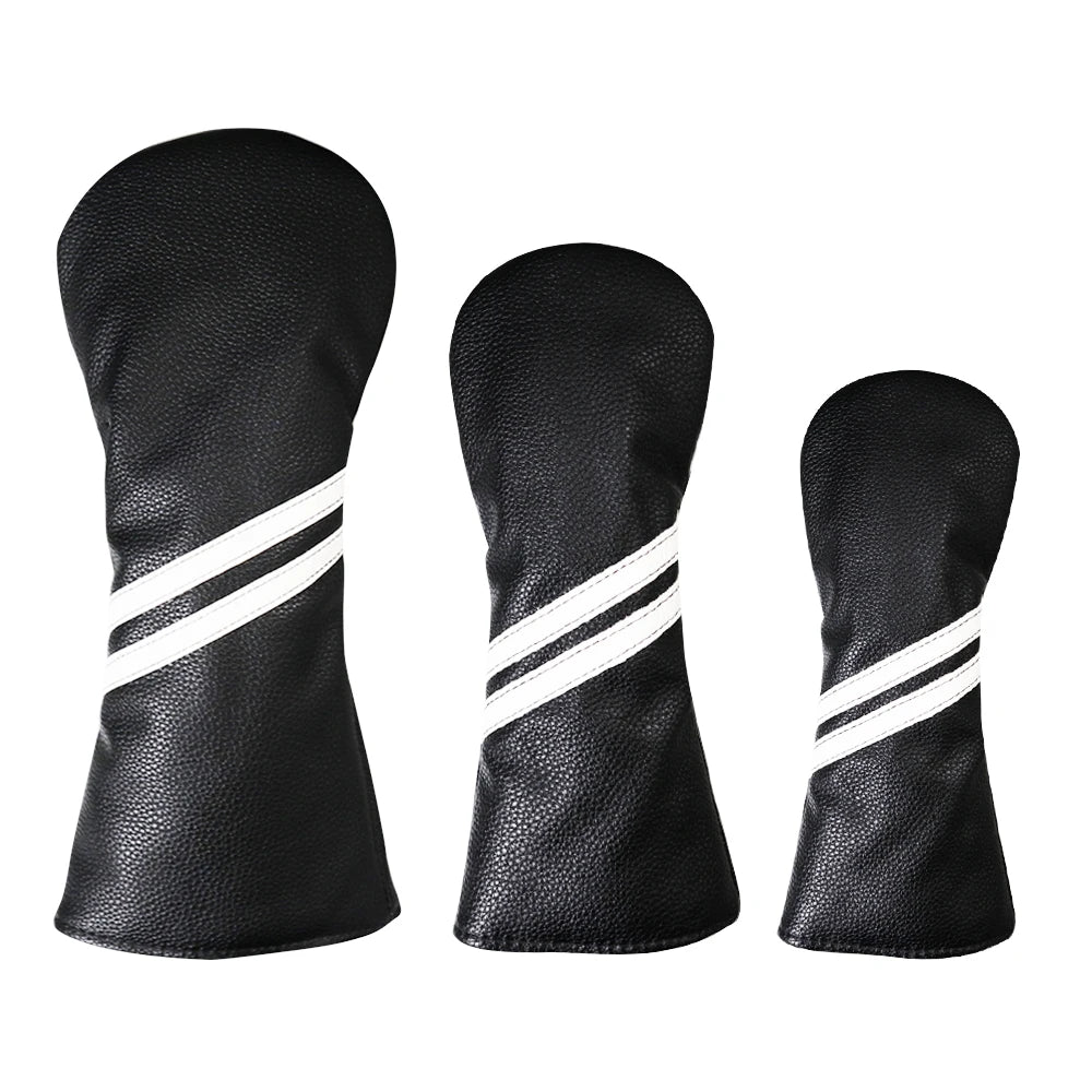 Three black golf club head covers with white stripes on a white background