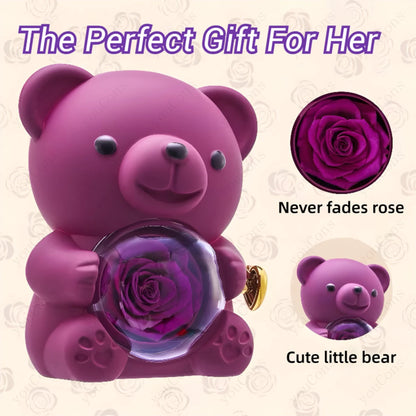 Purple teddy bear with an embedded rose, labeled 'The Perfect Gift For Her', on a light background.