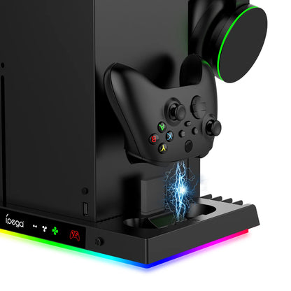 Gaming console with controller and RGB lighting on a white background