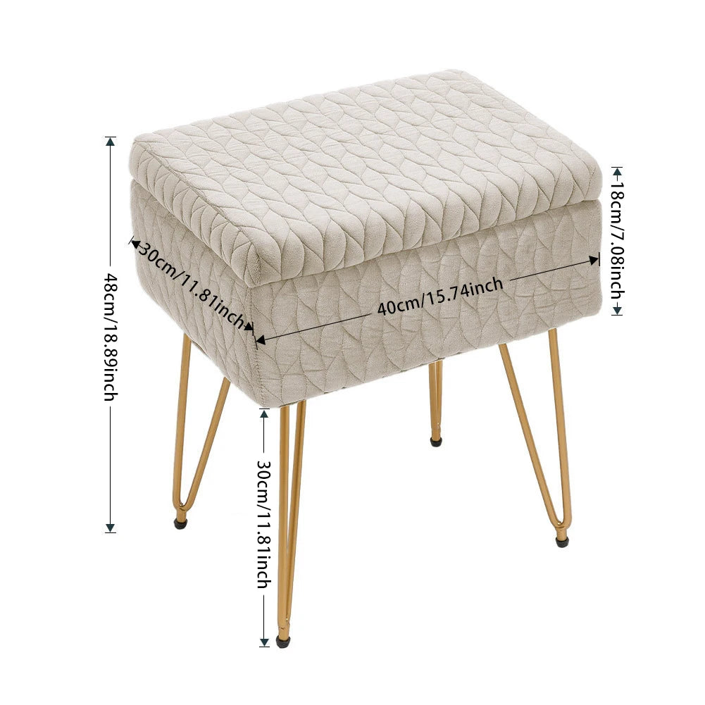 Beige ottoman with quilted design and gold legs, shown with dimensions on a white background.