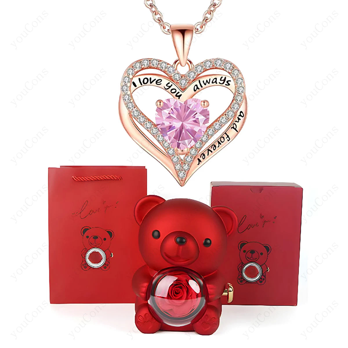 Heart-shaped necklace with pink gem and rose gold border, red teddy bear with rose, and red box on white background