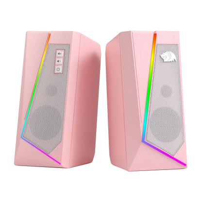 Pink computer speakers with RGB lighting on a white background