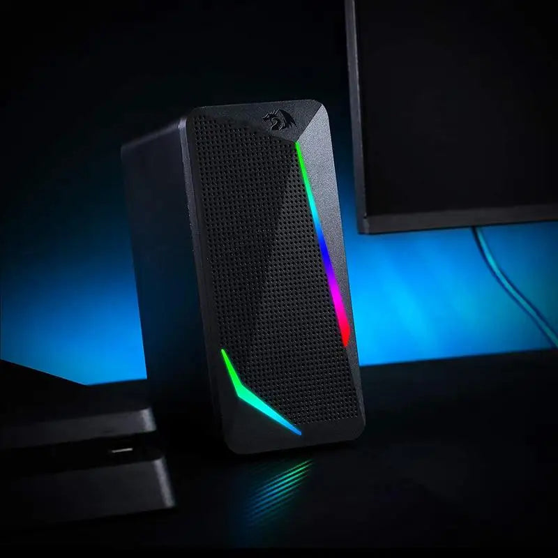 Gaming computer tower with RGB lighting on a dark background