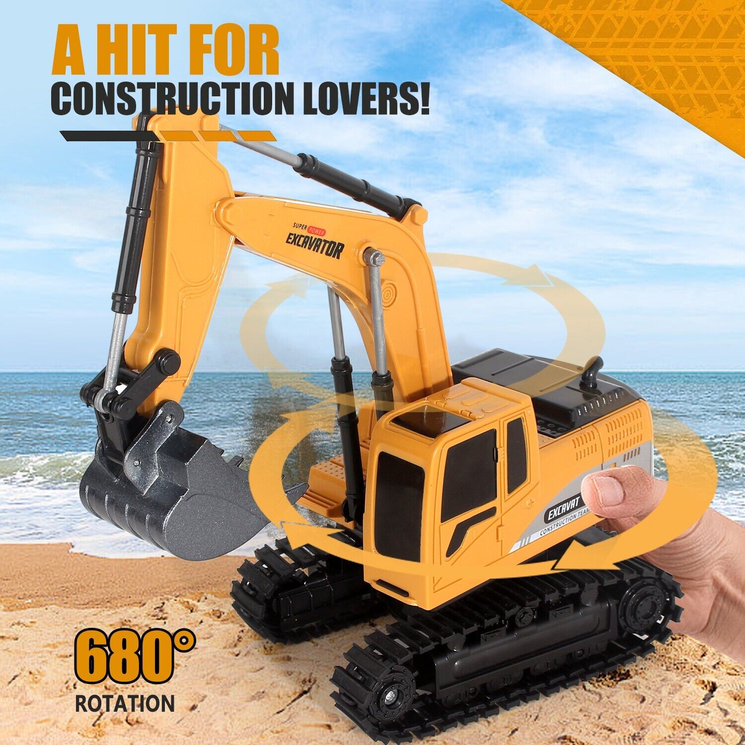 Toy excavator held by a hand with beach and ocean background