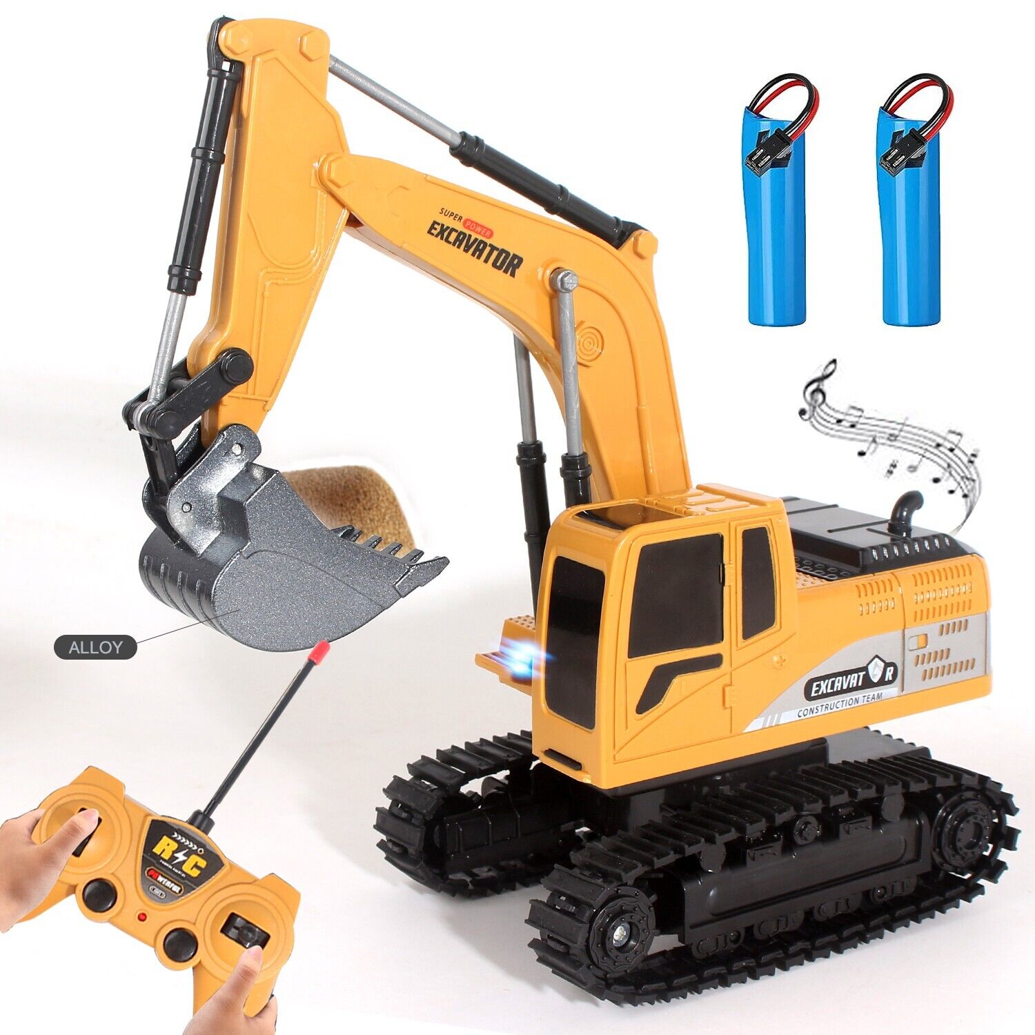 Toy excavator with remote control and batteries on a white background