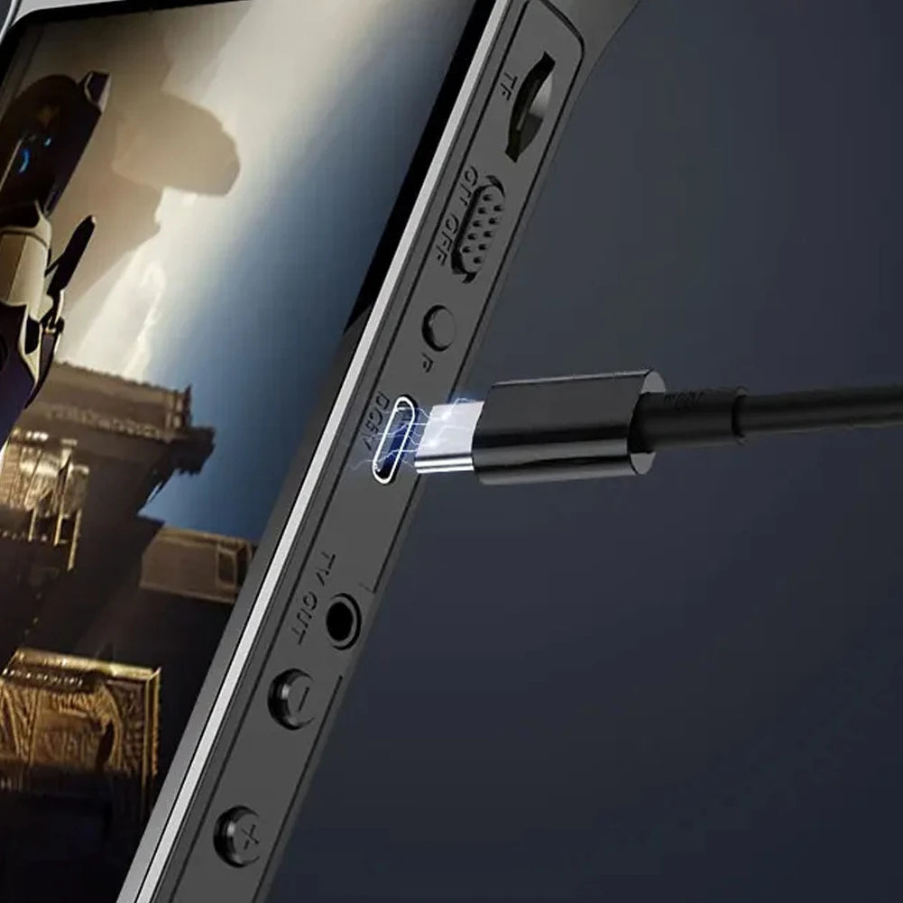 Close-up of a smartphone with a USB-C cable connected, screen displaying an image.