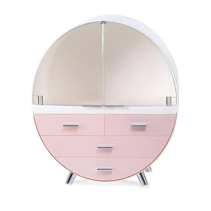 Round dresser with pink bottom half and beige top half on a white background