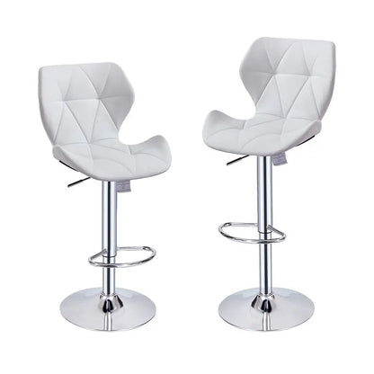 Two white bar stools with quilted design on a white background