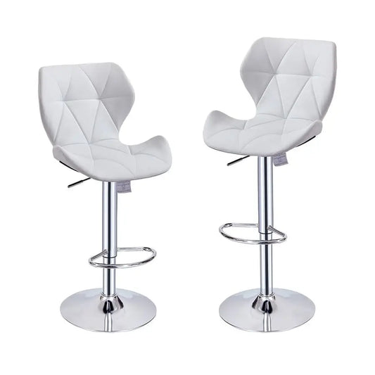 Two white bar stools with quilted design on a white background