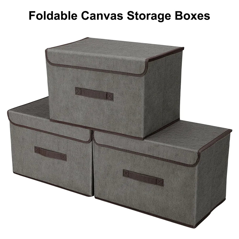 Set of three gray foldable canvas storage boxes with brown handles on a white background.