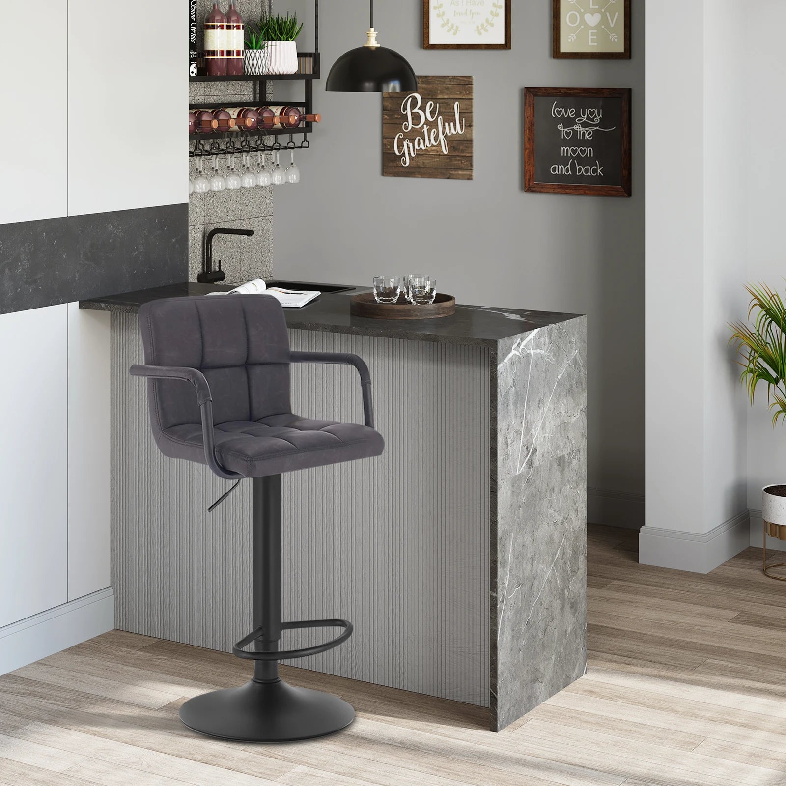 Modern bar setup with a gray bar stool and marble-like bar counter.