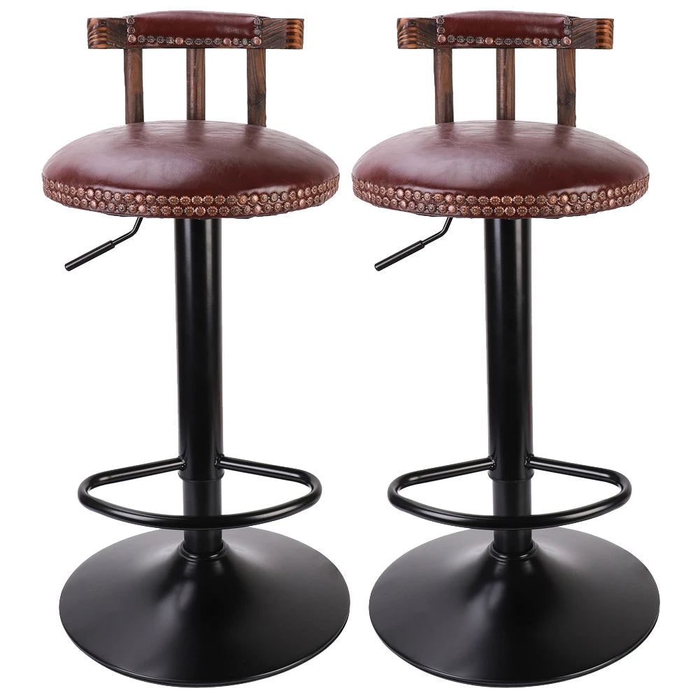 Two brown leather bar stools with black metal bases on a white background