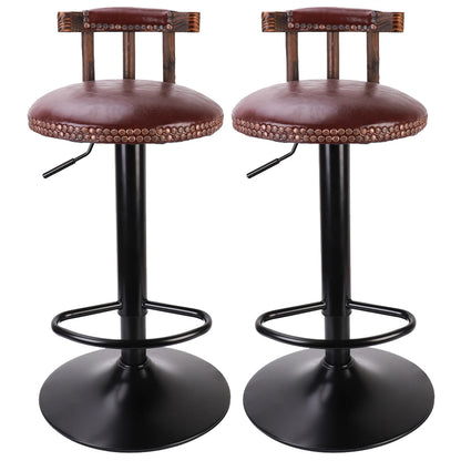 Two brown leather bar stools with black metal bases on a white background