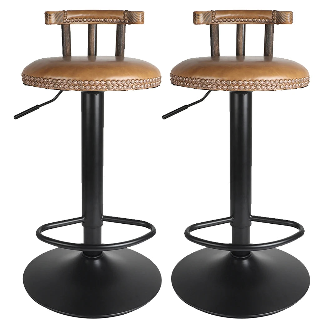 Two bar stools with brown seats and black metal legs on a white background