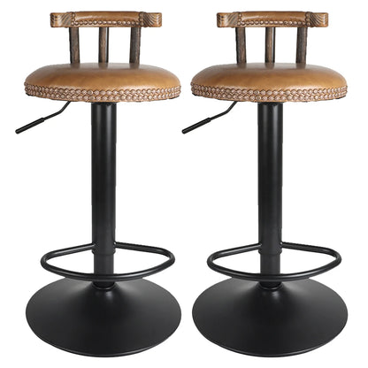 Two bar stools with brown seats and black metal legs on a white background