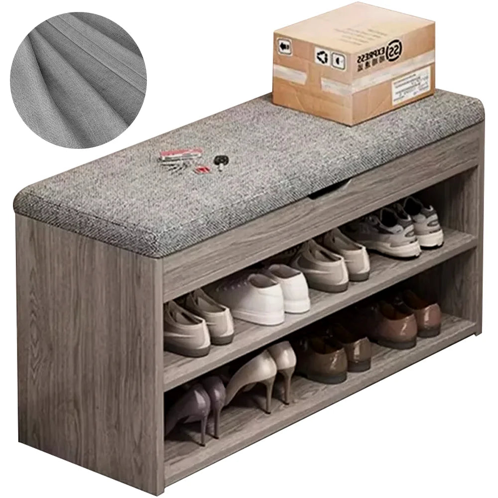 Wooden shoe bench with gray cushion and shoes on a white background
