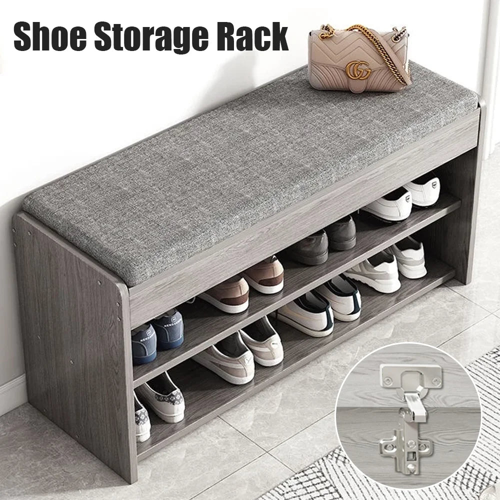 Shoe storage rack with cushioned bench and shoe shelves, featuring a close-up of a hinge.