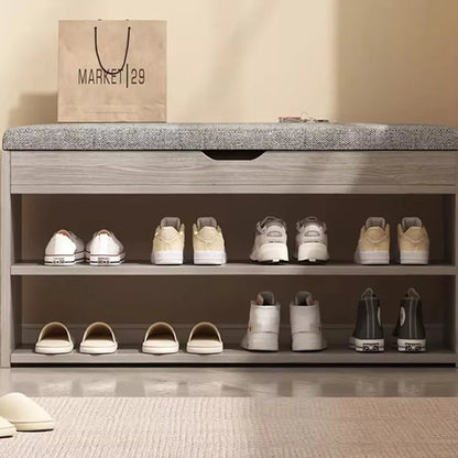 Shoe rack with various shoes on a neutral background