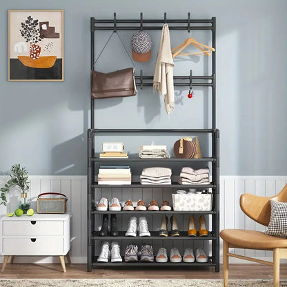 Multifunctional metal rack with shelves and hooks against a light blue wall.