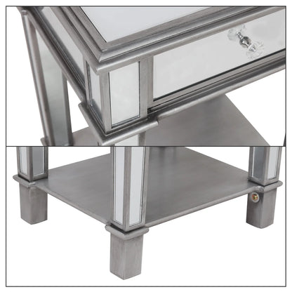 Silver mirrored side table with a drawer and shelf.