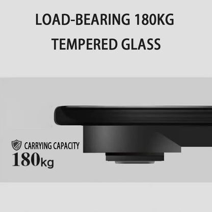 Black rectangular object with tempered glass and carrying capacity label on a white background