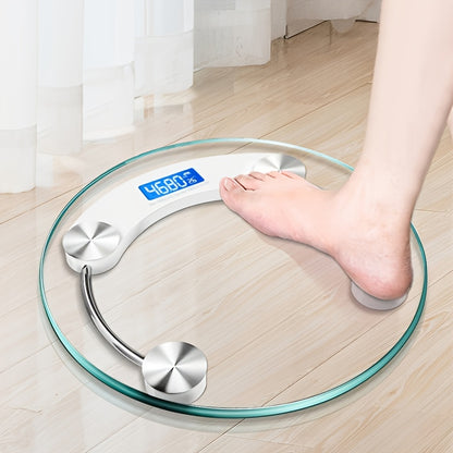 Person stepping on a digital glass scale with a blurred background