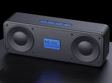 Black Bluetooth speaker with blue LED indicators on a dark background