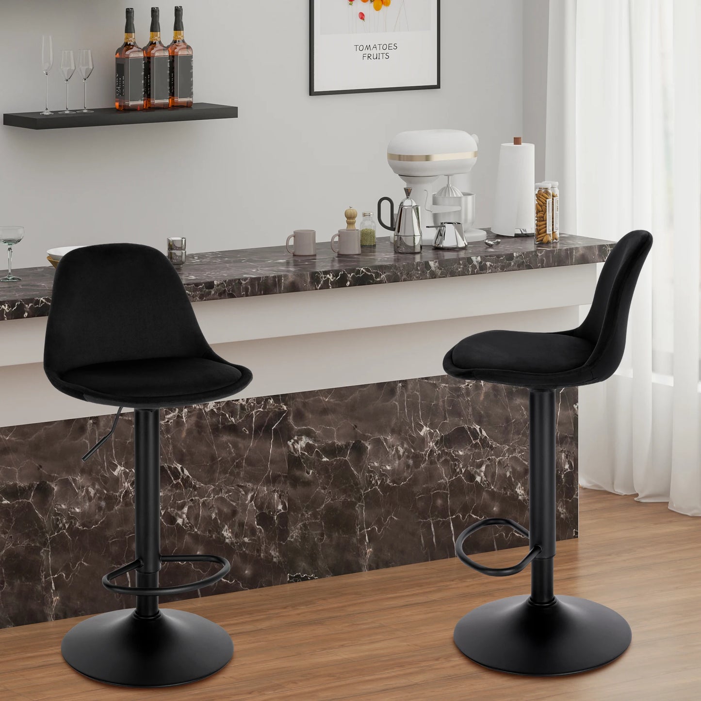 Two black bar stools in front of a marble countertop with kitchen items.