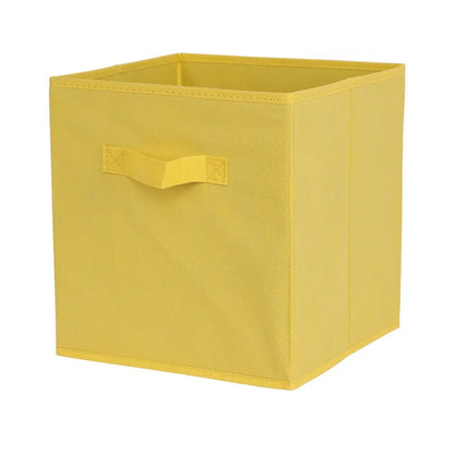Yellow storage cube with a handle on a white background