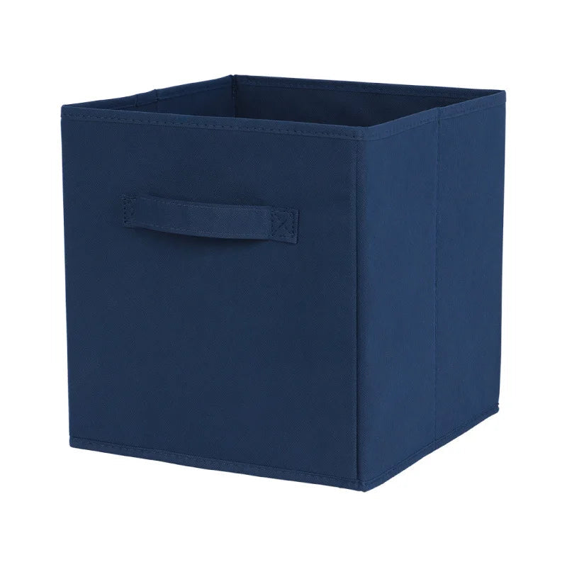 Blue storage cube with a handle on a white background