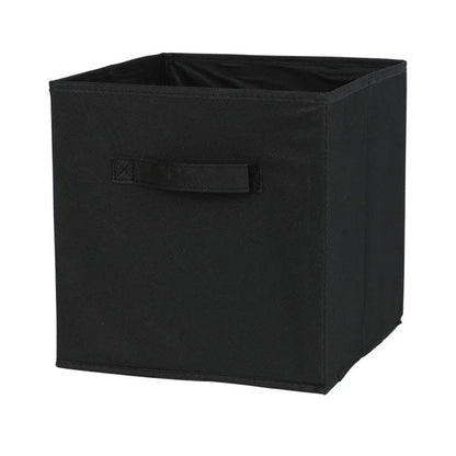 Black storage cube with a handle on a white background