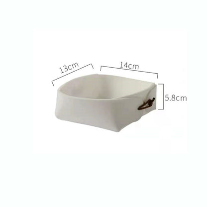 White ceramic bowl with dimensions labeled on a white background