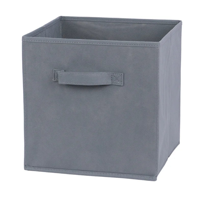 Gray storage cube with a handle on a white background