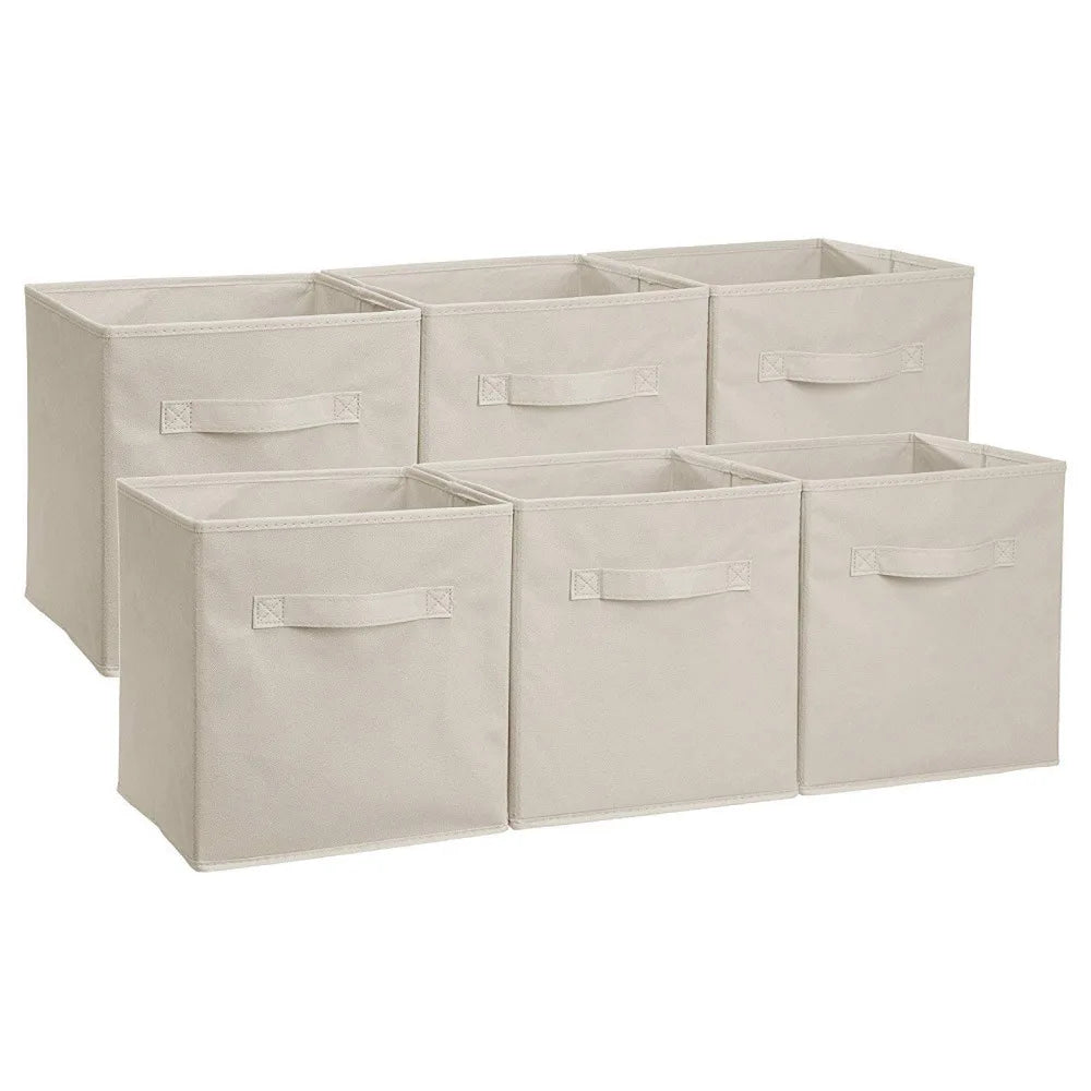 Set of six beige fabric storage cubes on a white background