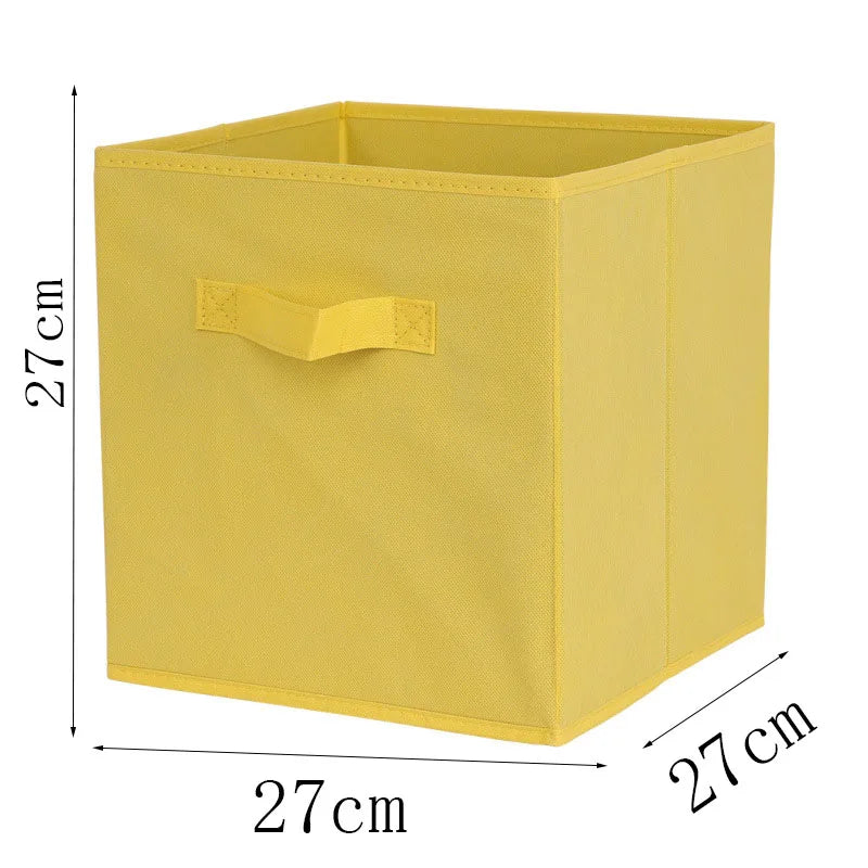 Yellow cube-shaped storage bin with dimensions on a white background