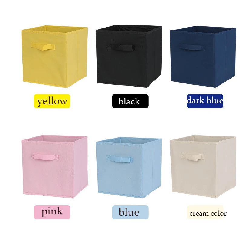 Collapsible storage cubes in various colors with labels on a white background