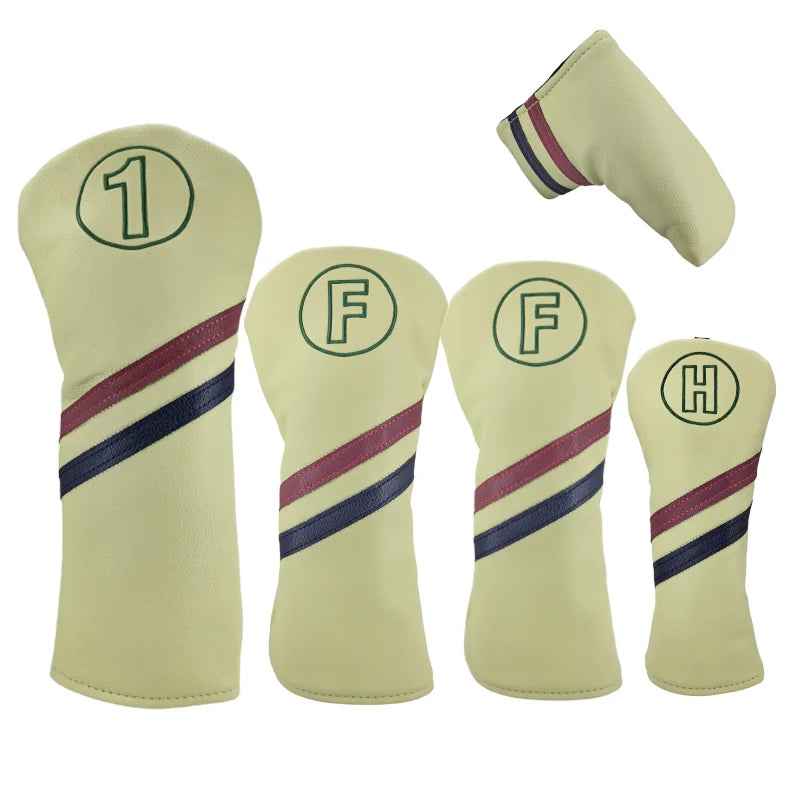 Set of beige golf club head covers with numbered and letter design on a white background