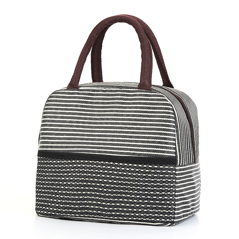Striped lunch bag with brown handles on a white background