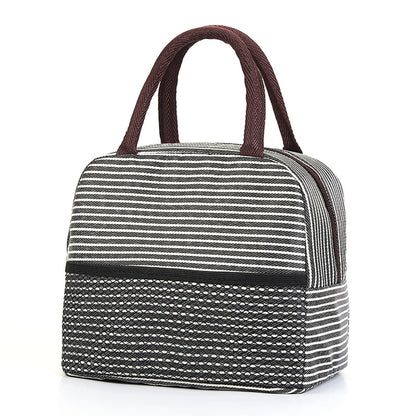 Striped lunch bag with brown handles on a white background