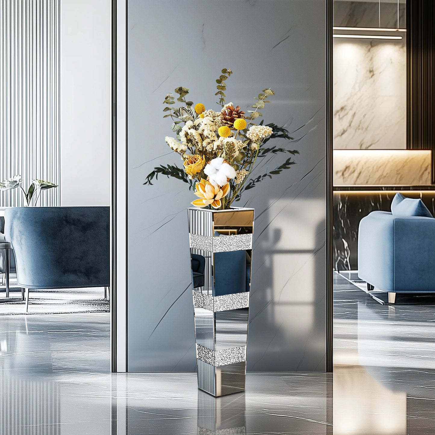 Modern interior with a decorative vase and flowers on a mirrored pedestal.