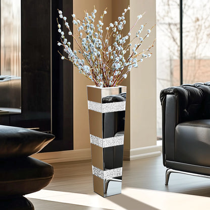 Decorative vase with floral arrangement in a modern living room.