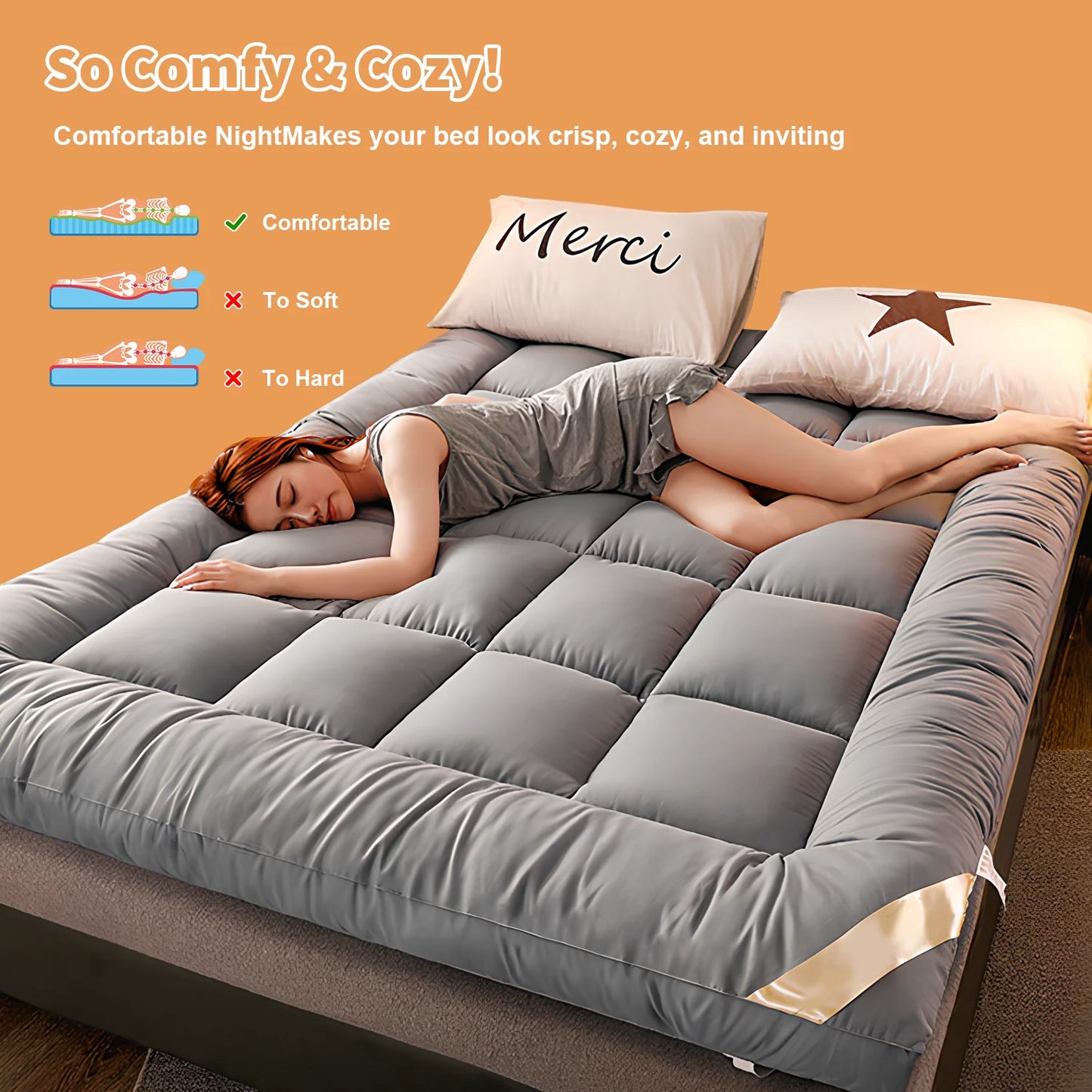Woman lying on a bed with a gray mattress topper, surrounded by pillows with 'Merci' text.