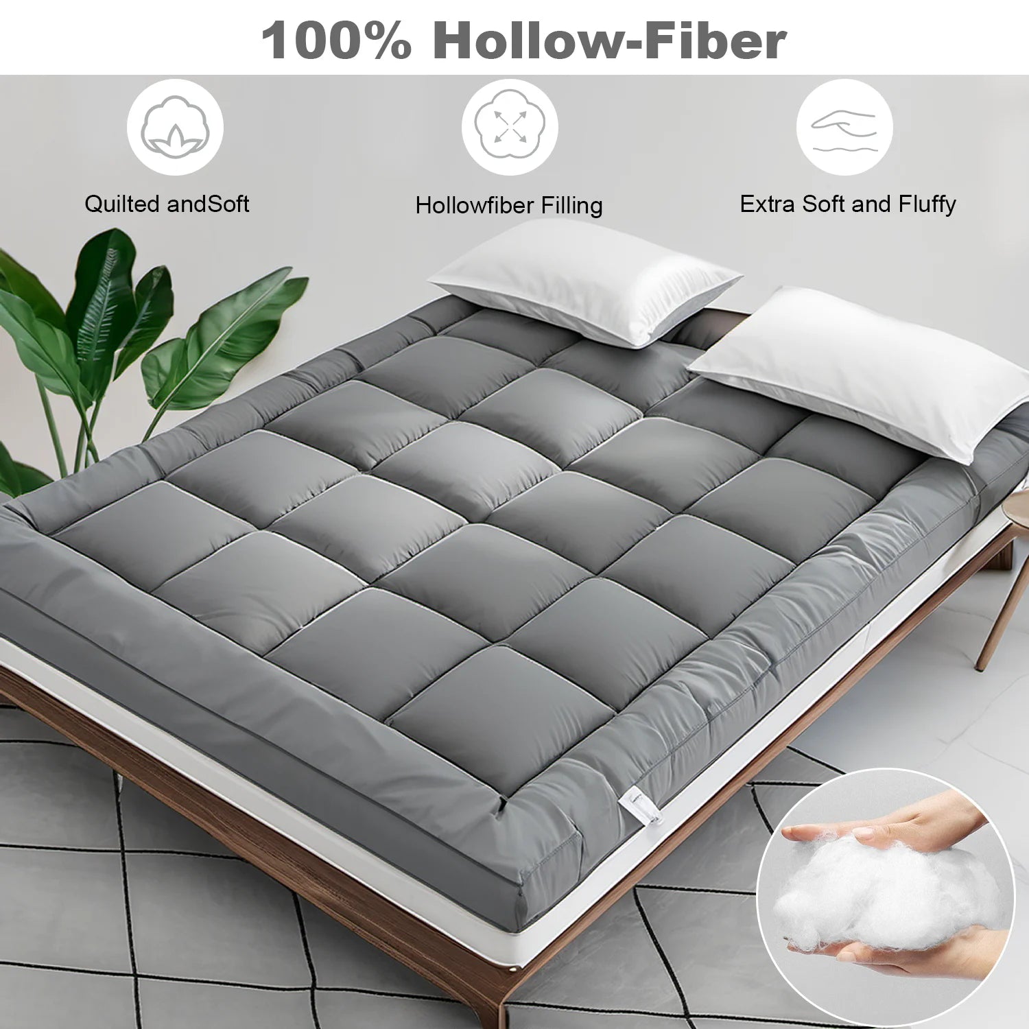 Gray mattress topper on a bed with text highlighting features like hollow-fiber filling.