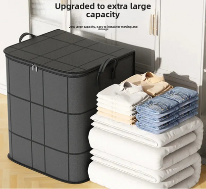 Black storage bin with folded clothes on a wooden floor, labeled 'Upgraded to extra large capacity'.