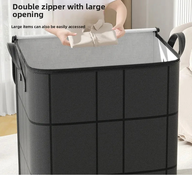 Person using a large gray laundry basket with a double zipper and large opening.